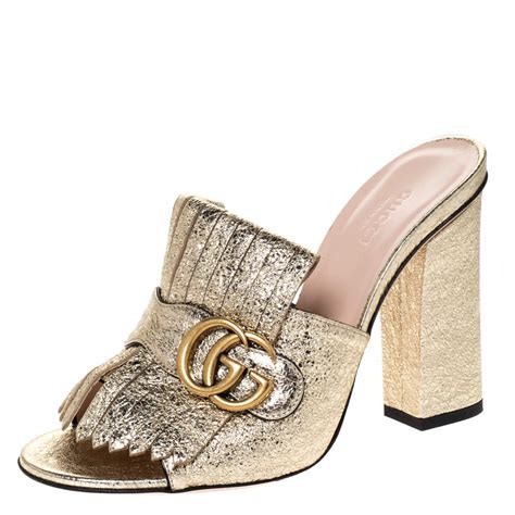 gucci mules gold.